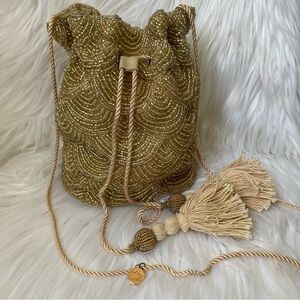From St Xavier Nevada Drawstring Beaded Bag Pouch Champagne Revolve Tassels